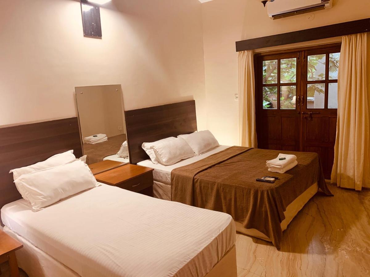 Pinnacle Holiday Homes Arpora Bagian luar foto