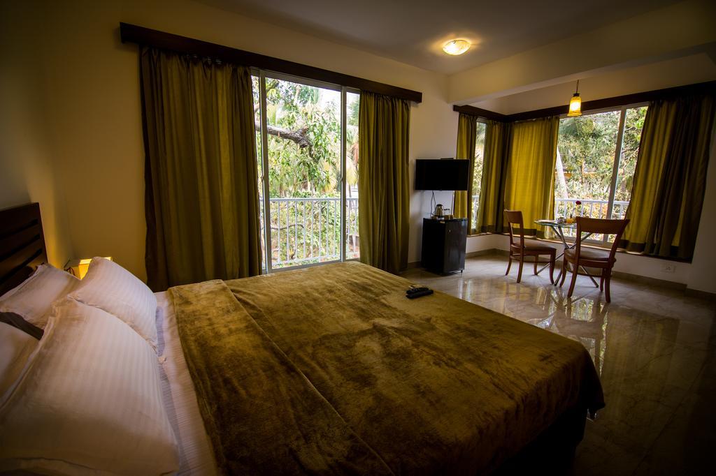 Pinnacle Holiday Homes Arpora Bagian luar foto