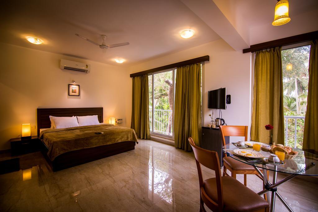 Pinnacle Holiday Homes Arpora Bagian luar foto